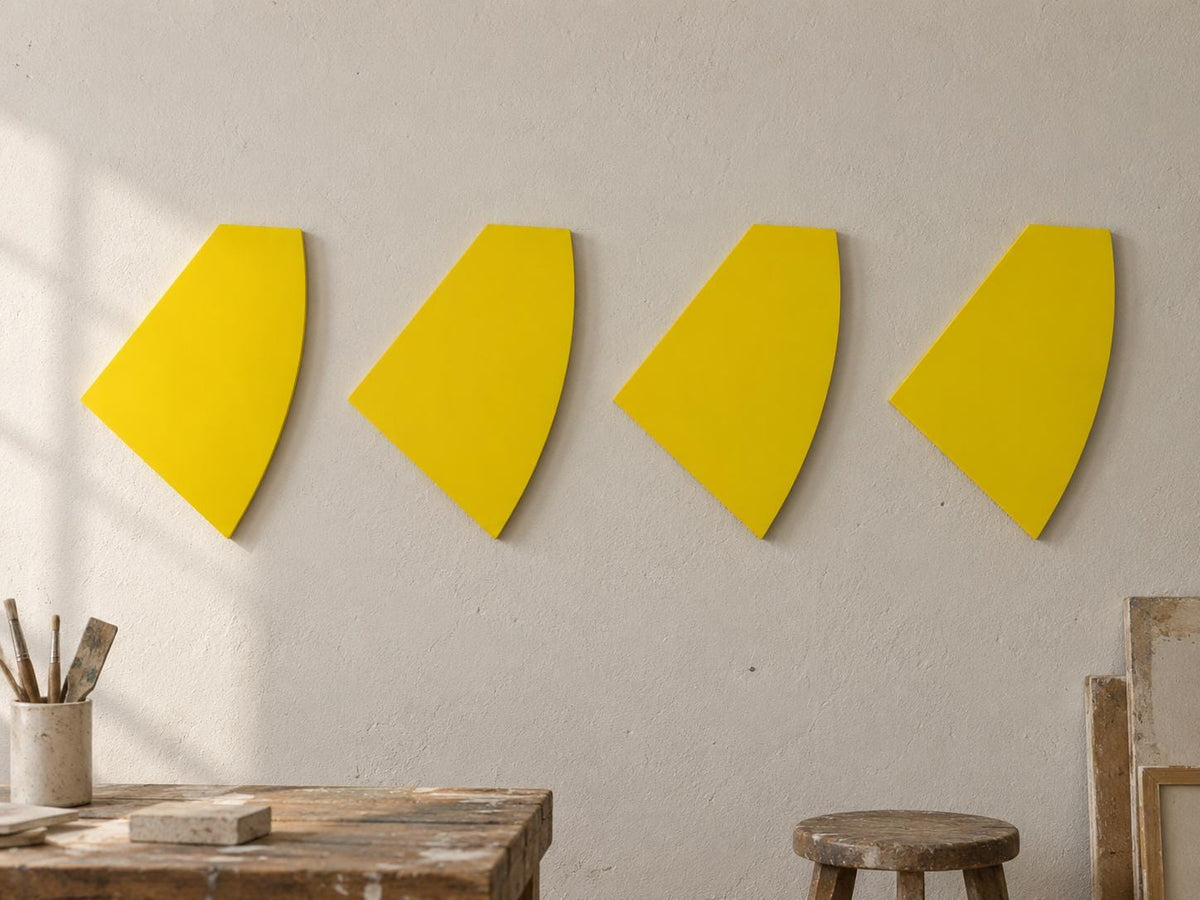 Four yellow curved-edge wall panels displayed in a row.