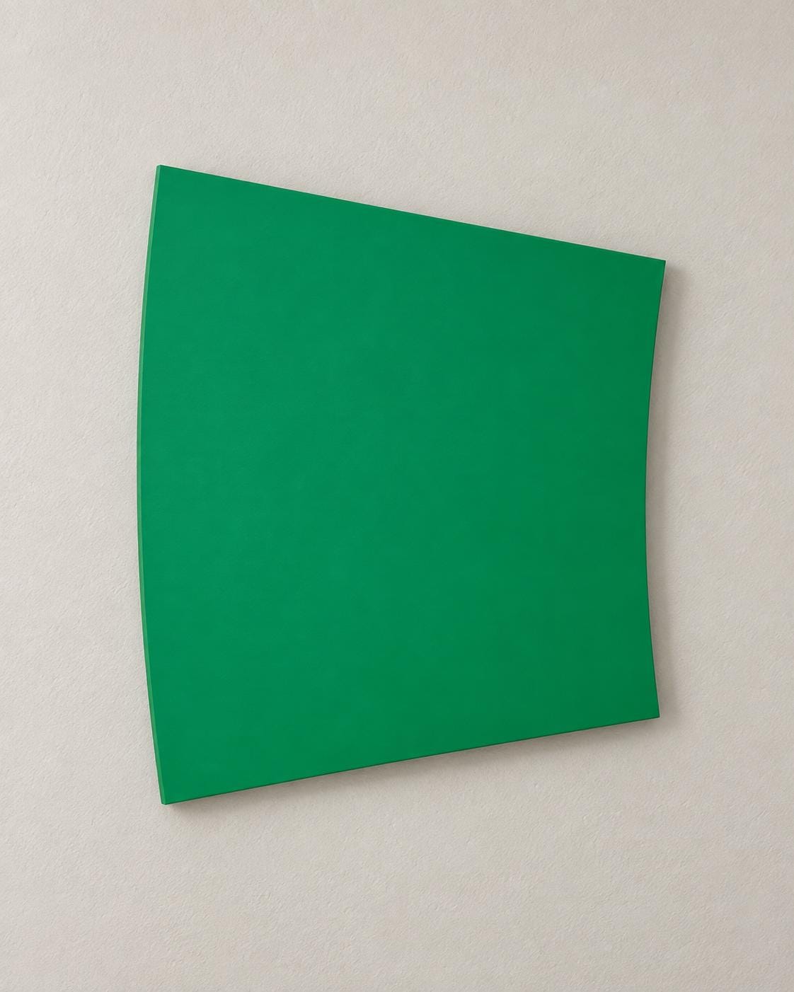 Green wall panel with subtly curved sides.