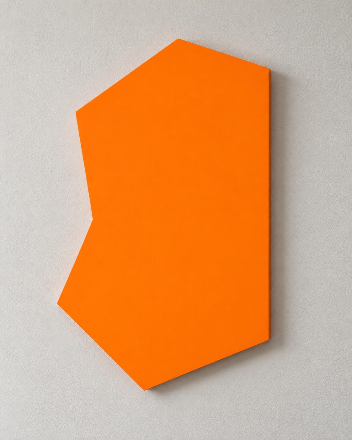 Orange irregular wall panel with a notch along its left edge.