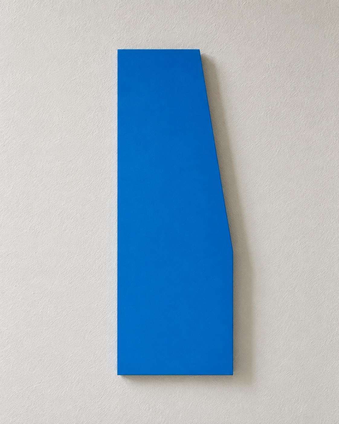 Tall blue wall panel with an angled right edge.